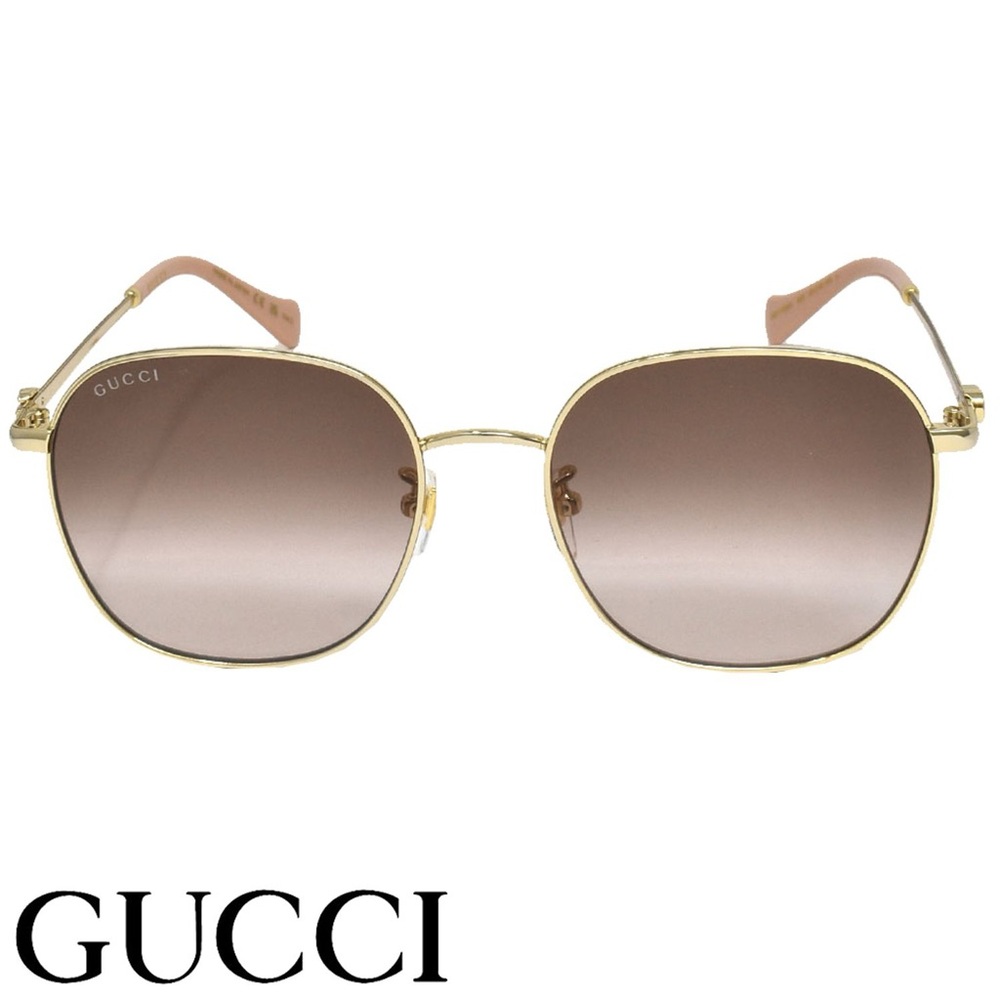 Gucci Women's Gold Frame Sunglasses with Brown Lenses